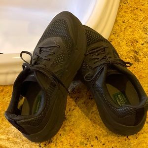 Sketchers Go Run solid black men’s shoes. Size 10.5 Wide width.